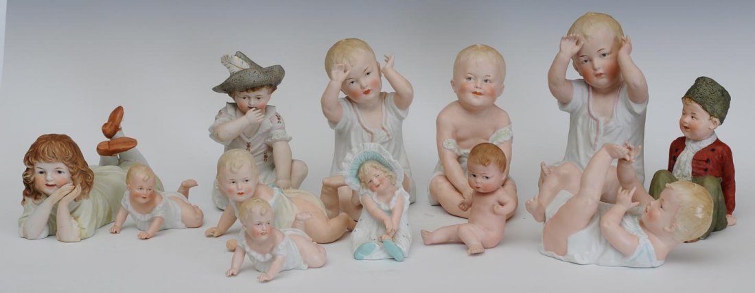 Group of Twelve Piano Babies: largest 9" estimate 300/500