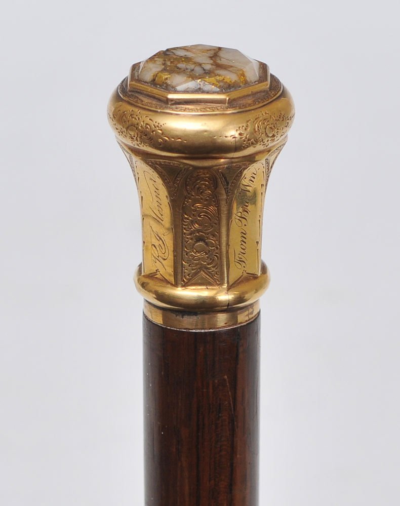California Gold Quartz Walking Stick: with presentation "from bro. Wm / to R.J. Menner" William Menner arrived in California in 1853 as a miner and eventually operated a mercantile in the gold mining community of North San Juan. estimate 