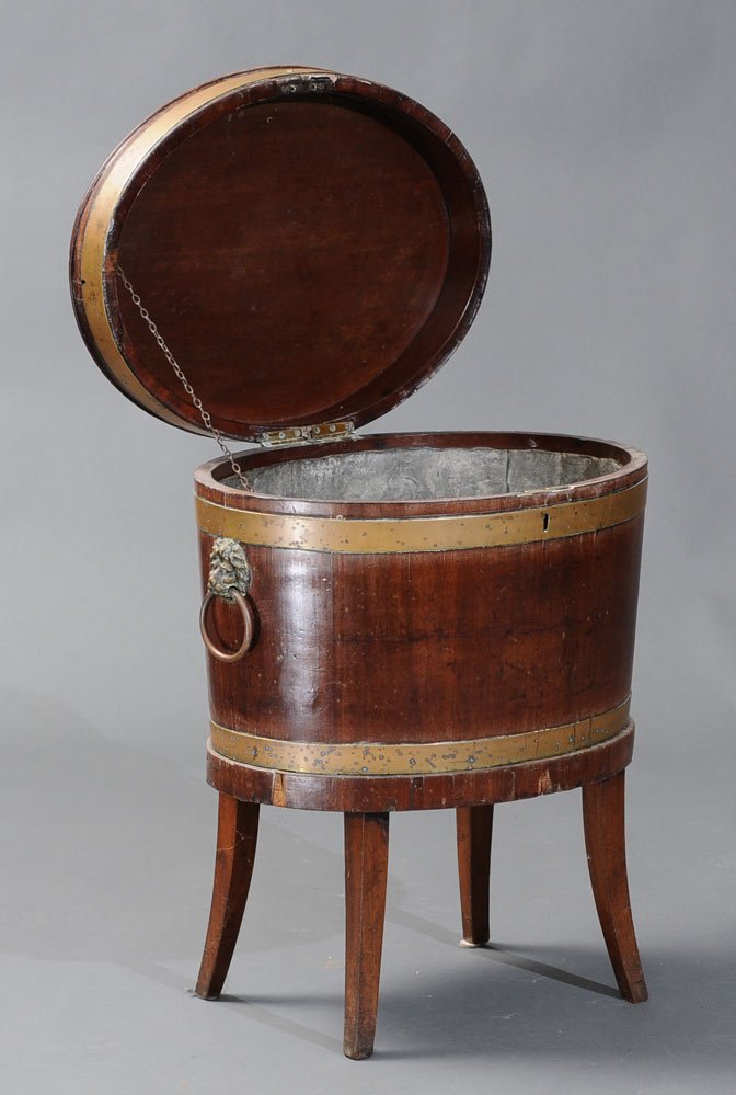 Regency Mahogany Cellerette: with brass banding 21" x 16", 25" high circa 1810 estimate 800/1200 Buyer is responsible for arranging 3rd party shipping.