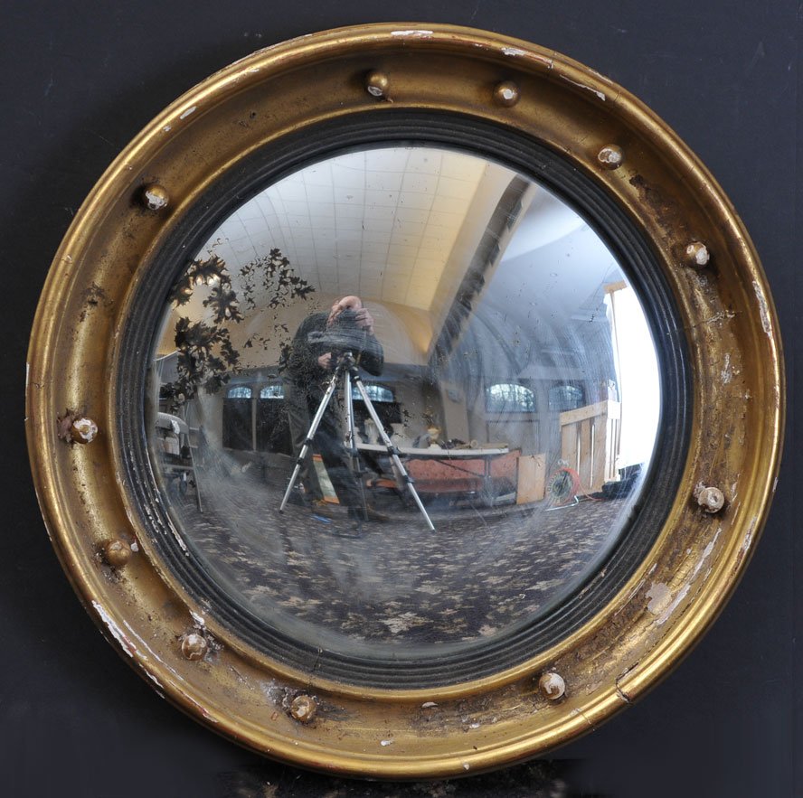 Regency Giltwood Convex Mirror: 22" diameter early 19th century estimate 300/500 Buyer is responsible for arranging 3rd party shipping.