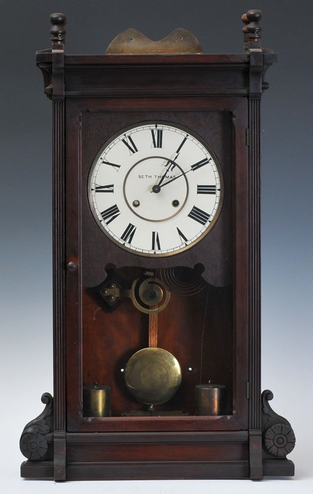 Seth Thomas Regulator: time and strike, weight driven 29 1/2" high circa 1900 estimate 400/600 Buyer is responsible for arranging 3rd party shipping.