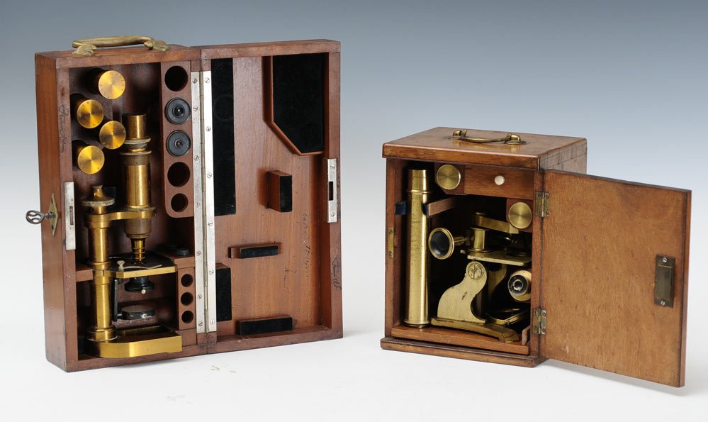 Pair of Cased Microscopes: one signed Carl Zeiss, the other unsigned largest 13" high, estimate 300/500