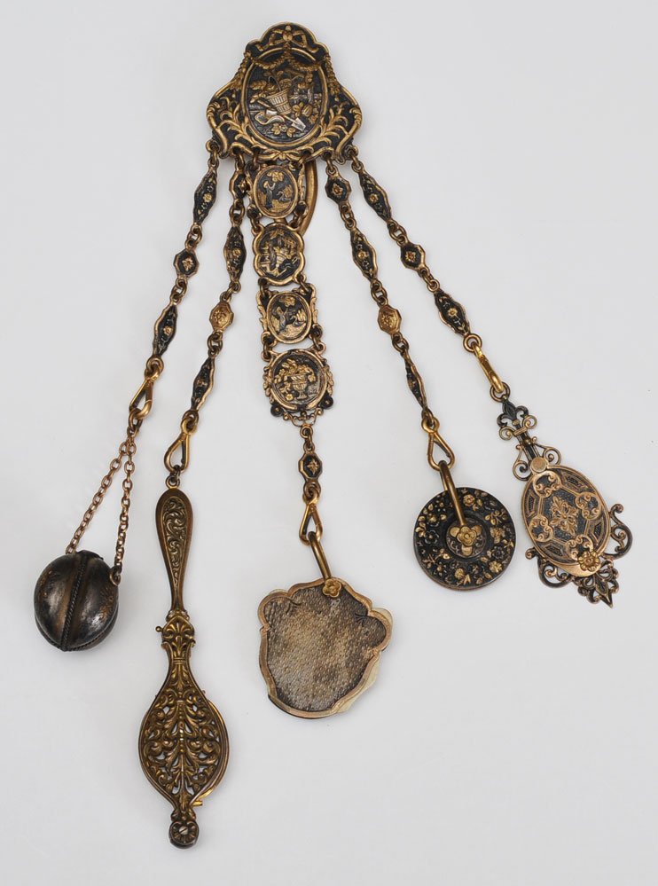 Victorian Chatelaine: consisting of mirror, perfume, dance card and spectacles, estimate 200/300