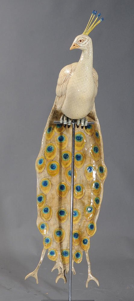 Sergio Bustamante: Peacock painted paper mache 65" high with stand numbered 1/100 chrome plated stand estimate 800/1200