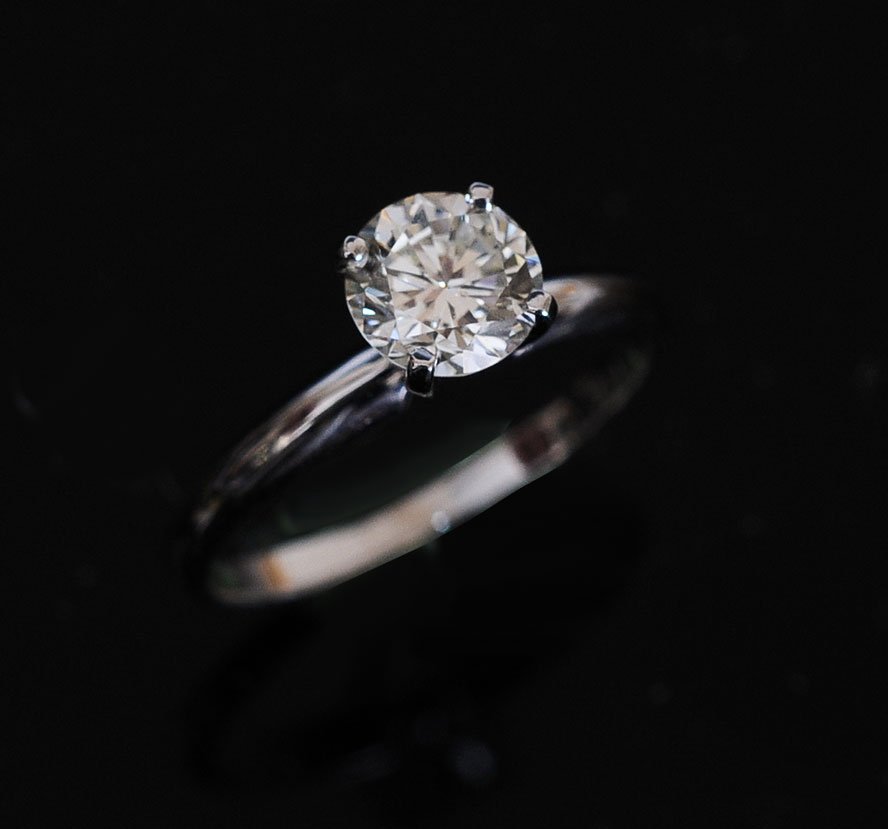 14K Diamond Solitaire Ring: approximately 1.05 carats, VS1, K-L color, stone estimate 1200/1800