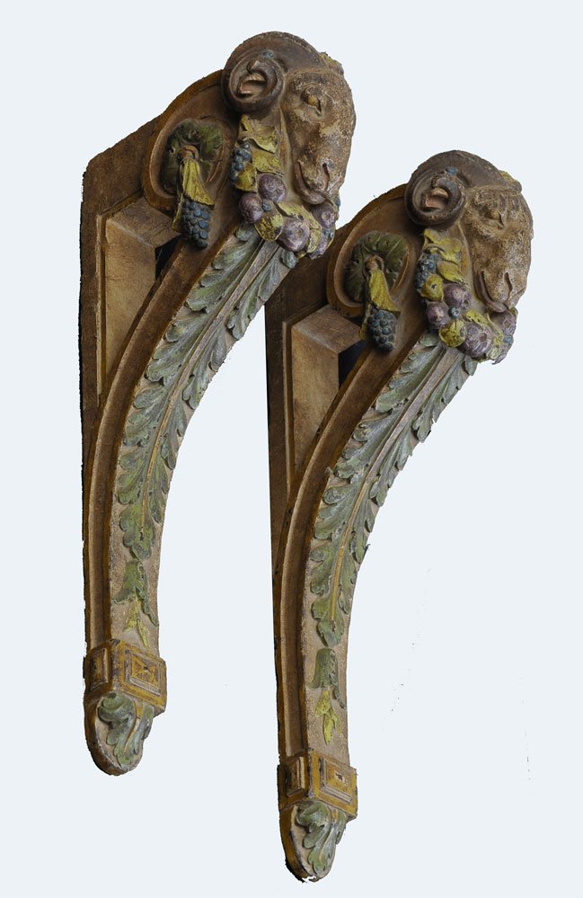 Pair of Louis XV Style Brackets: carved and polychromed with rams' heads and garlands nearly identical, 24" long and 25" long circa 1900 estimate 800/1200