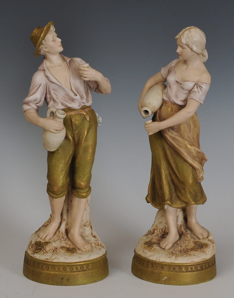 Pair of Royal Dux Ceramic Figures: depicting a peasant couple 17 3/4" high estimate 200/300