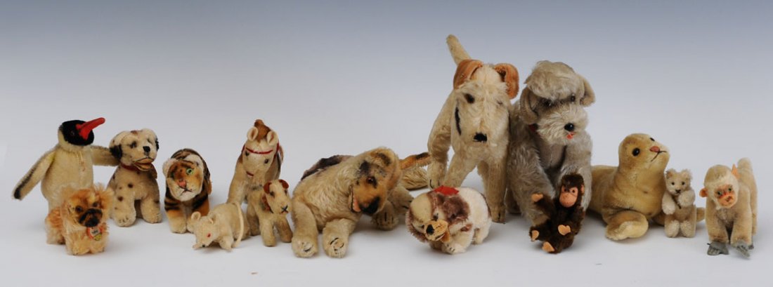 Group of 15 Steiff Animals: including 8" jointed poodle, 9" terrier, 13" German shepherd mid-20th century Group of 15 Steiff Animals