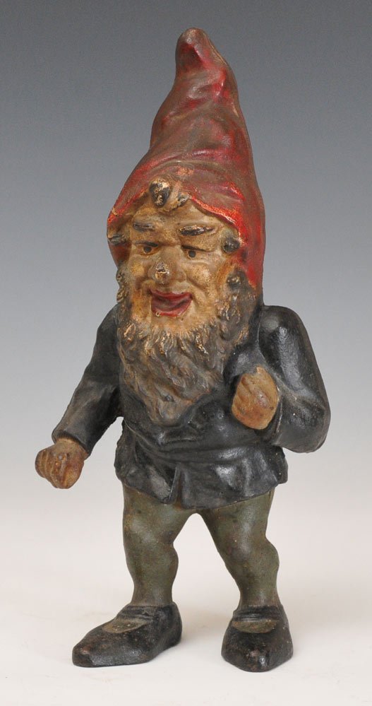 Cast Iron Gnome Doorstop: 13 1/2" high early 20th century