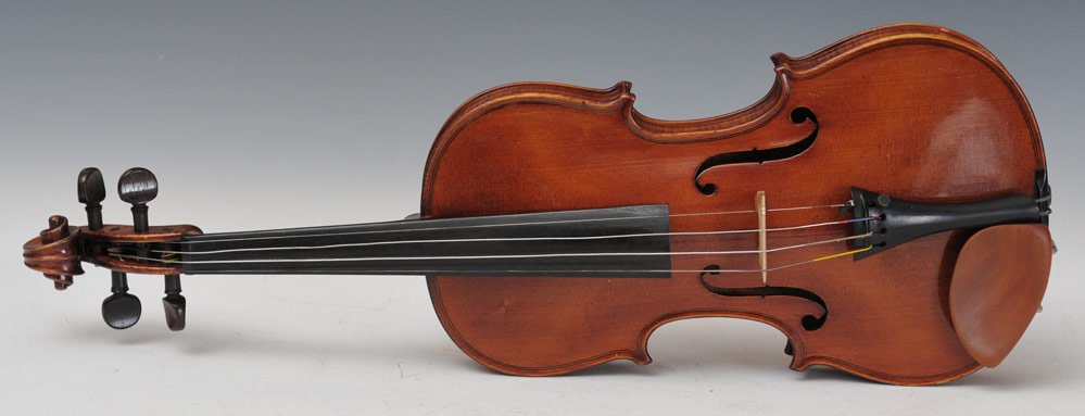 Violin: labeled "Fernando Solar Gonzales ??28/ hecho in Madrid Ano 1955" 23" long, back 14 1/2" with case and two bows, one by Gonzales, the other F.C.Pfretzschner