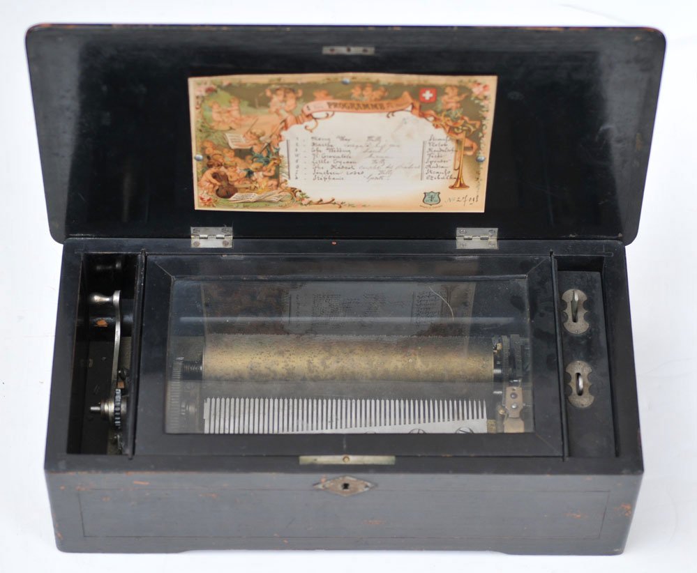Victorian Swiss Music Box: with 8 1/4" cylinder playing 8 tunes with song sheet 17" x 8 1/2", 5" high