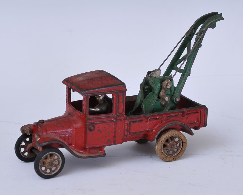 Arcade Cast Iron Baby Red Wrecker: with original driver and steel hub caps 10" long circa 1920