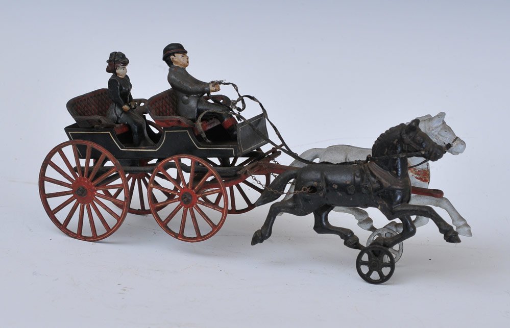 Pratt & Letchworth Cast Iron Double Seat Wagon: with driver and lady passenger 15" long