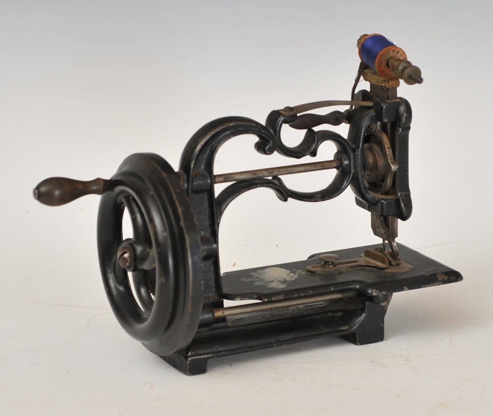 Early Cast Iron Sewing Machine: Shaw and Clarke style 11" x 5", 8" high circa 1868