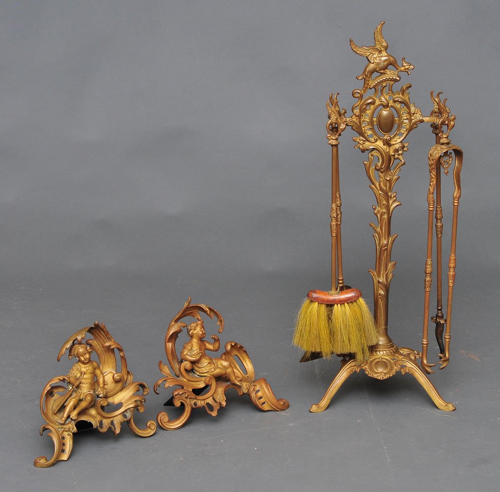 French Style Fireplace Set: including four tools, 33" stand and a pair of 10" chenets probably early 20th century SHIPPING: Buyer is responsible for arranging 3rd party shipping. Also see 3rd party shipper list provided in SHIPP