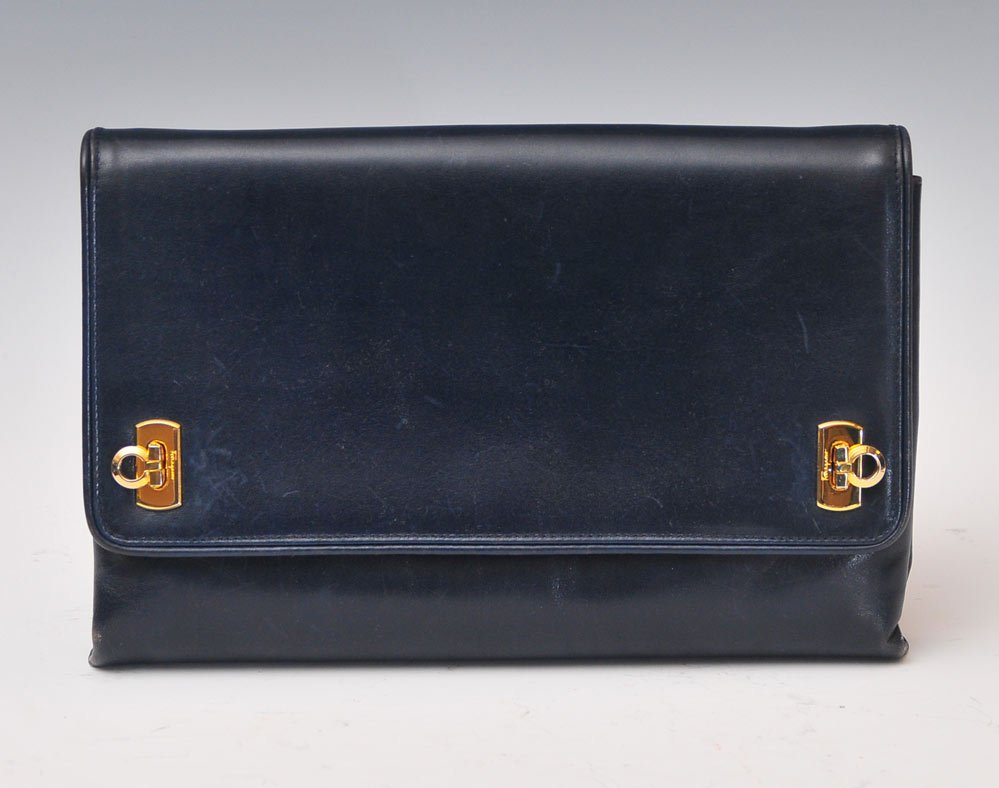 Group of Four Handbags: including 10 3/4" Ferragamo, 9" Gucci, Dofan and unsigned lizard skin bag SHIPPING: Shipping available within the Continental USA (excludes insurance) $35. International buyers are responsible for arr