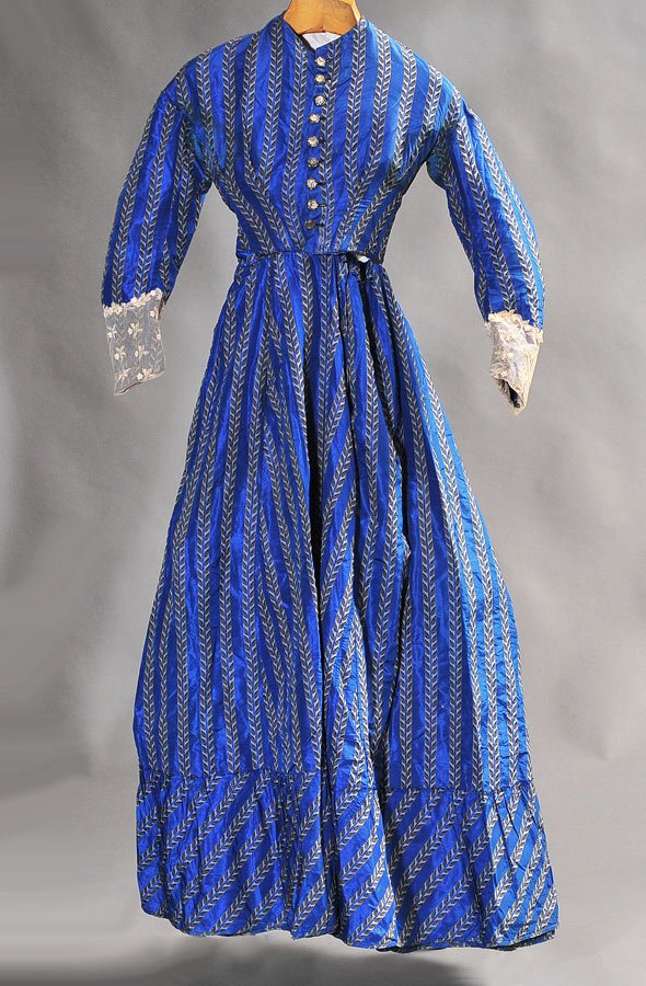 Victorian Blue Wedding Dress: 57" long, 24" waist together with a gentleman's vest mid-19th century SHIPPING: Shipping available within the Continental USA (excludes insurance) $30. International buyers are responsible for arrangi