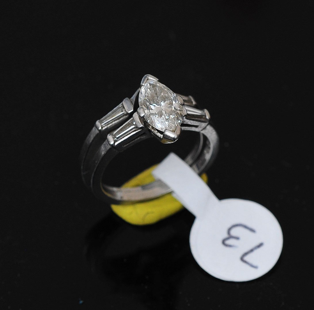 14k Gold Diamond Solitaire Ring: approximately 1 ct marquise cut diamond together with matching diamond wedding band ring size 5 1/2, 5 dwt gross SHIPPING: Shipping available within the Continental USA (excludes insurance) $25. Inter