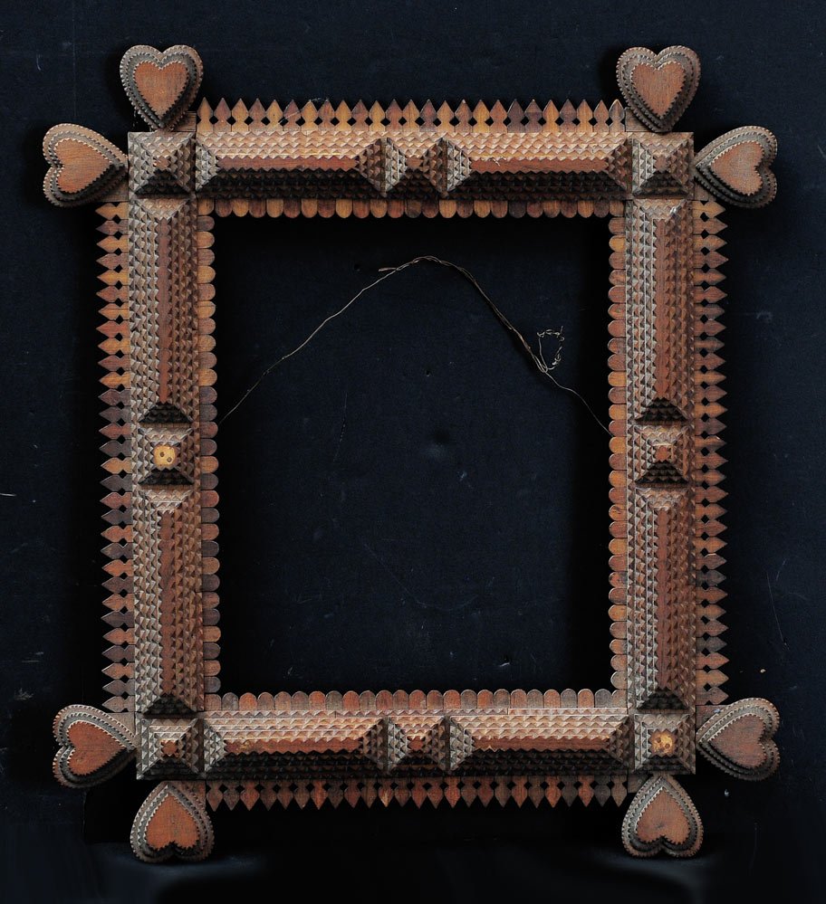 Tramp Art Frame: with heart decoration 24" x 21 1/2" overall 15" x 12" rabit early 20th century SHIPPING: Buyer is responsible for arranging 3rd party shipping.