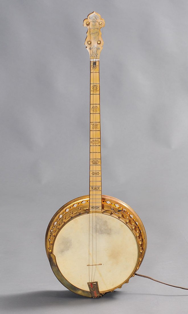 Leedy Solotone Banjo: with decorated celluloid neck and back 38" long fitted with electric lights inside comes with case early 20th century SHIPPING: Shipping available within the Continental USA (excludes insurance) $70. 