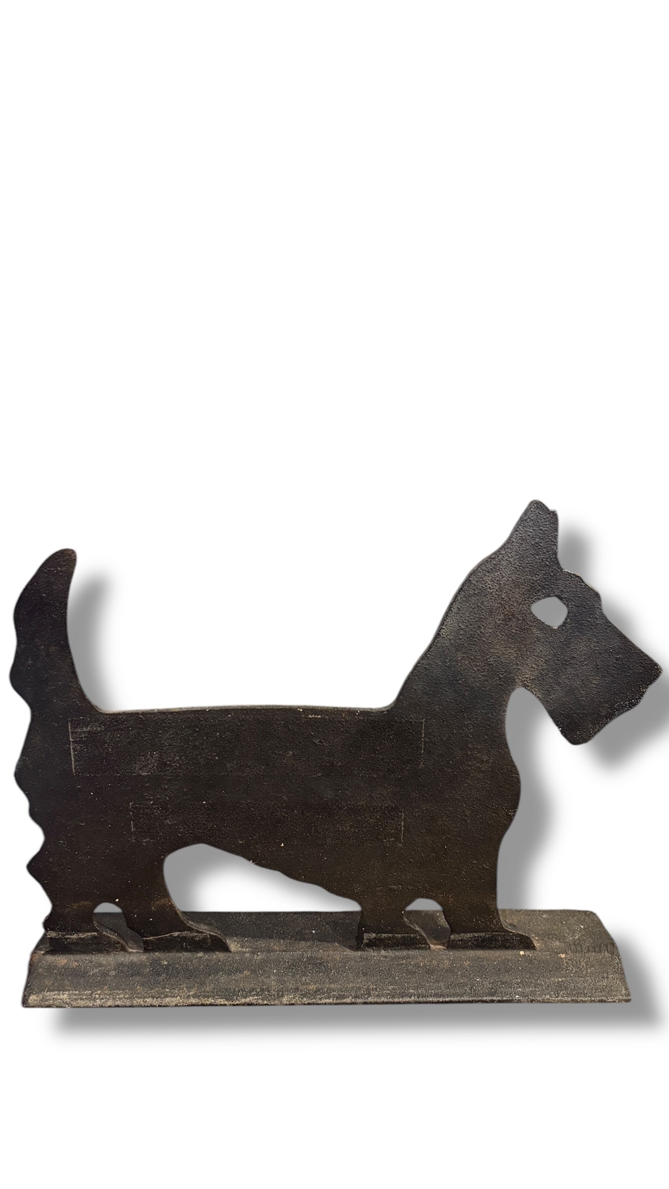 Scotch Terrier Boot Scrape/Door Stop: Cast iron doorstops became popular in the 19th century as a practical and decorative way to keep doors open. The Scottish Terrier, or Scottie, was a particularly popular motif, reflecting the breed's