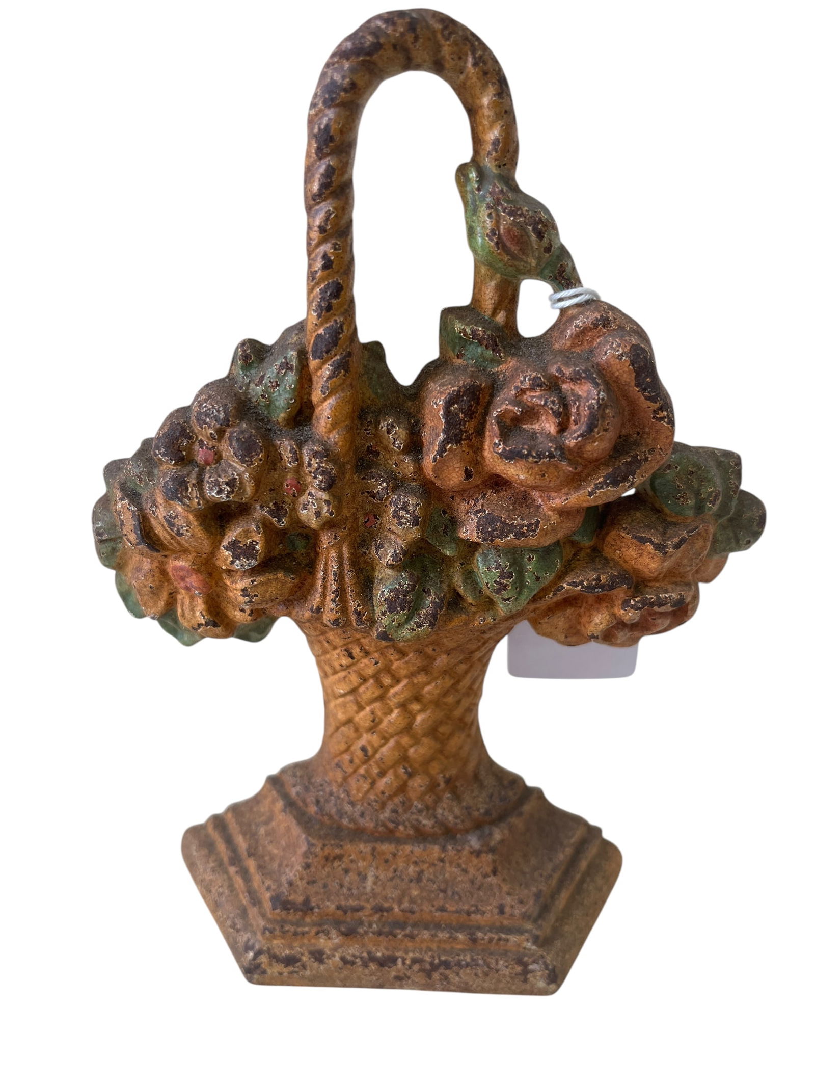 Antique Cast Iron Flower Basket Doorstop: Cast iron doorstops became popular in the 19th century as a practical and decorative item for homes. They were particularly prevalent in the United States, where numerous foundries produced a wide var