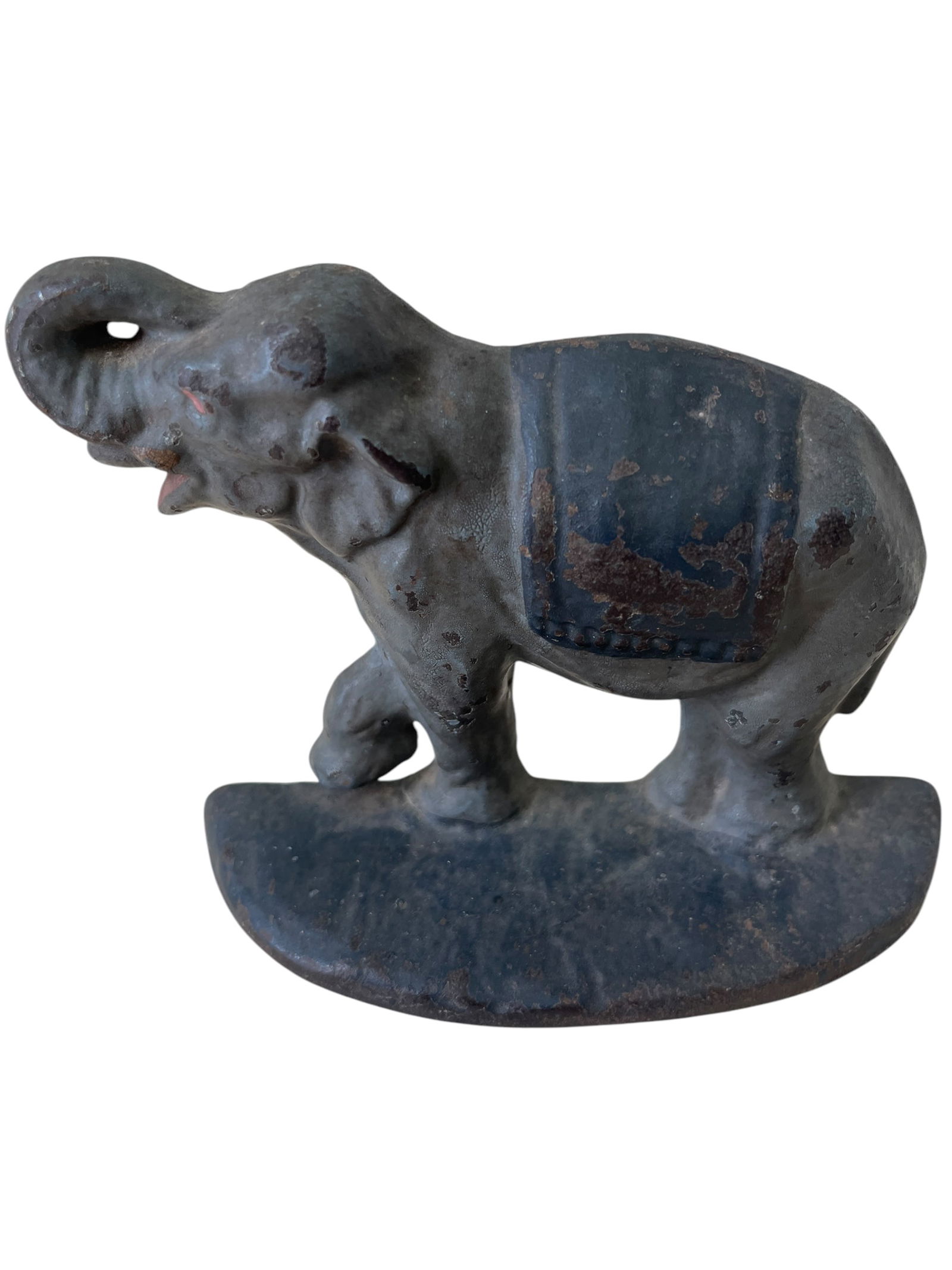 Cast Iron Trunk Cast Iron Up Elephant Doorstop: Cast iron doorstops and bookends were popular decorative and functional items in American homes from the late 19th century through the mid-20th century. These items were often produced in figural form