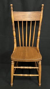 Vintage Pressed Back Chair: The antique pressed back oak chair shows the timeless elegence of the country home seating. The wood is turned in several places on the chair frame. The chair is in nice condition and doesn't appear t