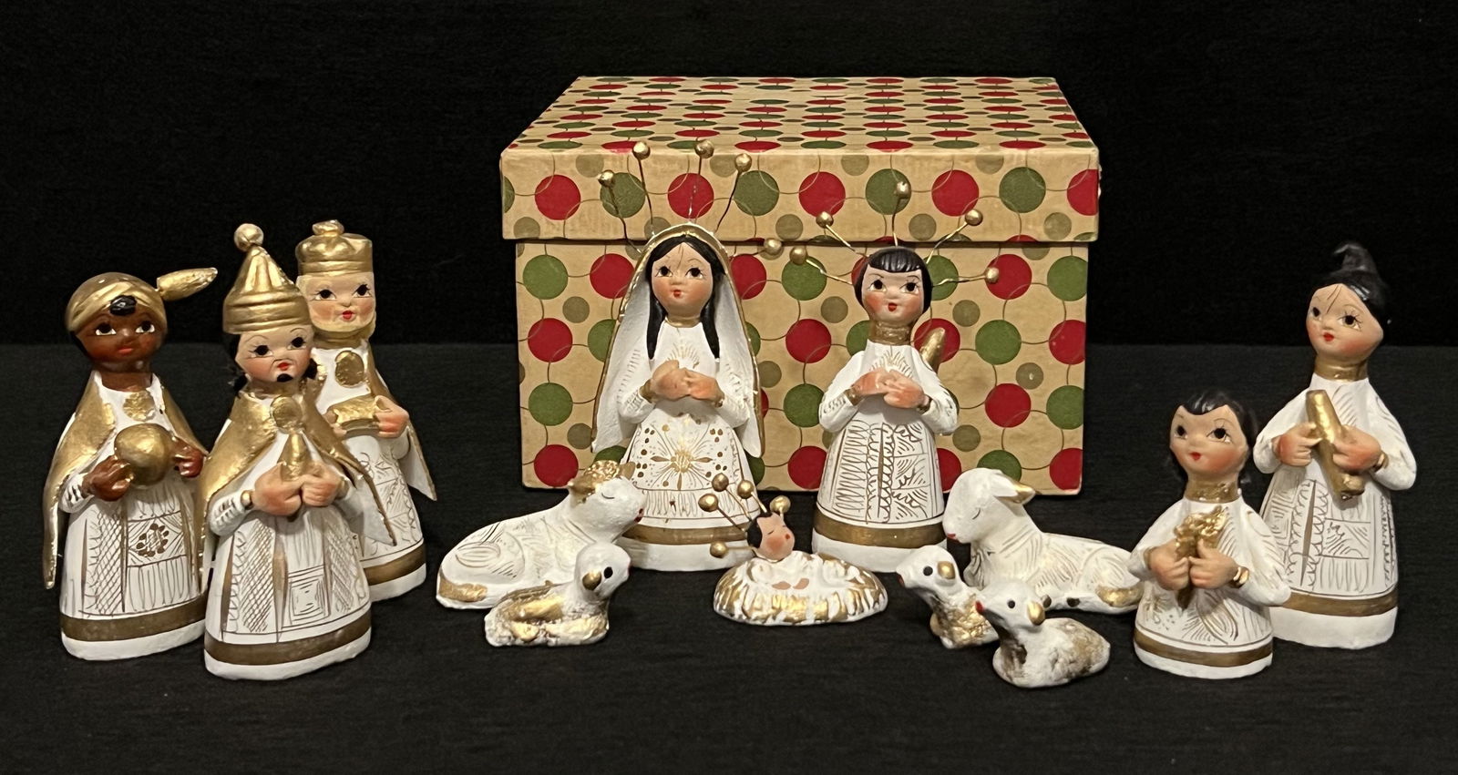 Mexican Nativity Scene: The Mexican nativity scene is made of 13 white with gold painted clay pottery pieces. It's so cute and the baby in the manager is really special. It's in good condition with no visual flaws. It's hous
