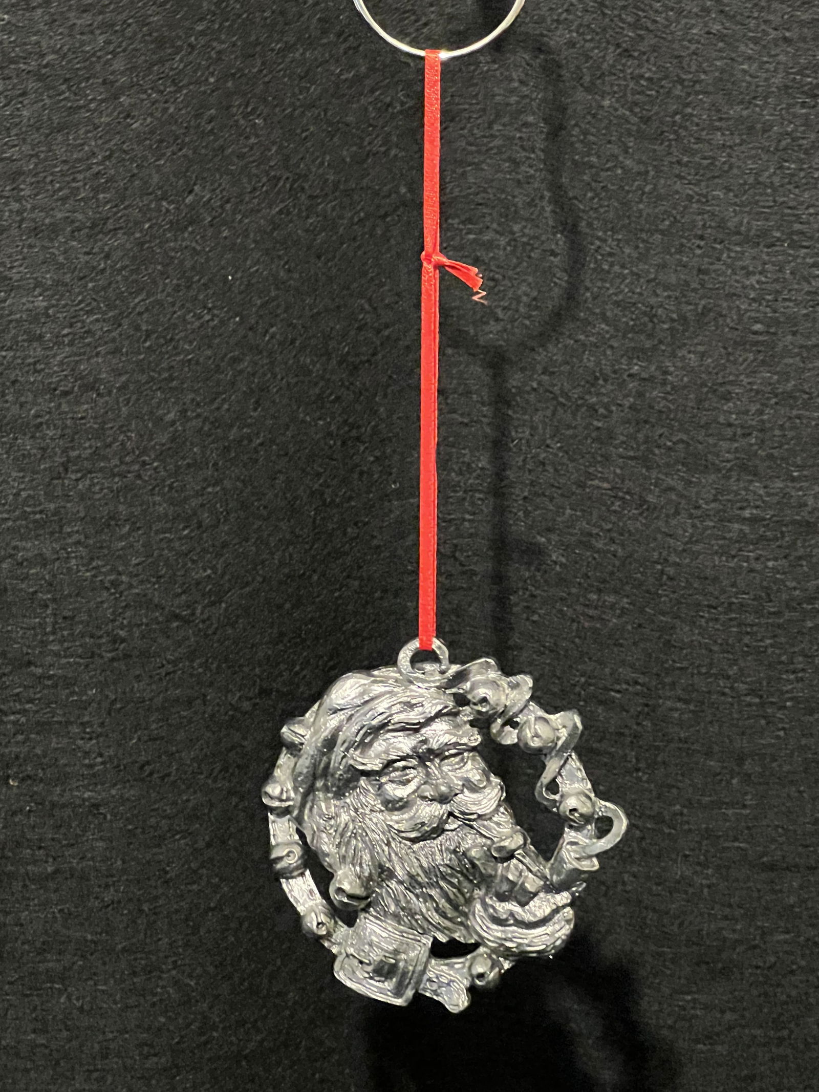 Michael Ricker's Solid Pewter "1992 Christmas Ornament Nast Santa": This rare ornament was cast in 1992 and is in mint condition. "968/2500" Includes Certificate of Casting (COC)(3 1/2" x 1/2") (1lbs.) Estimate: $20 - $30