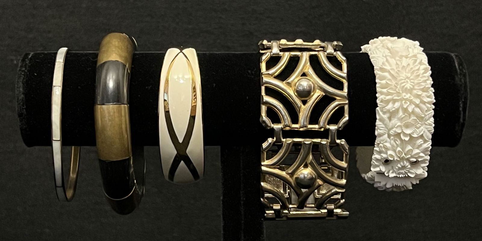 Lot of 5 Nice Bracelets: Slim copper and mother-of-pearl bangle bracelet in fine condition. (2.75" diameter) Ebony & brass bangle bracelet that has a little weight to it. It's in fairly good condition but shows a few visible