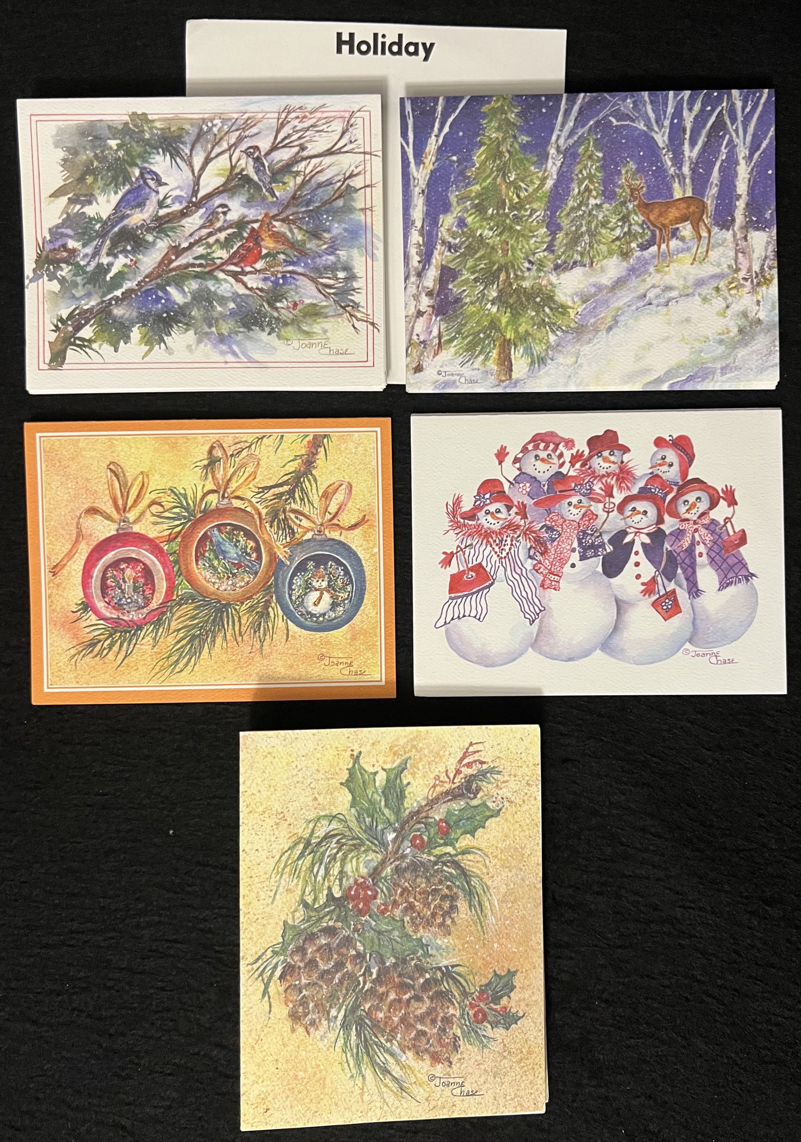 Rare/Discontinued Original Joanne Chase Artistic 74 Holiday Cards: 74 Assorted original watercolor holiday design cards by Joanne Chase. Approximate numbers of cards include: 51 Holiday greeting cards 12 Blank holiday cards 11 Thank You holiday cards. Please note: On