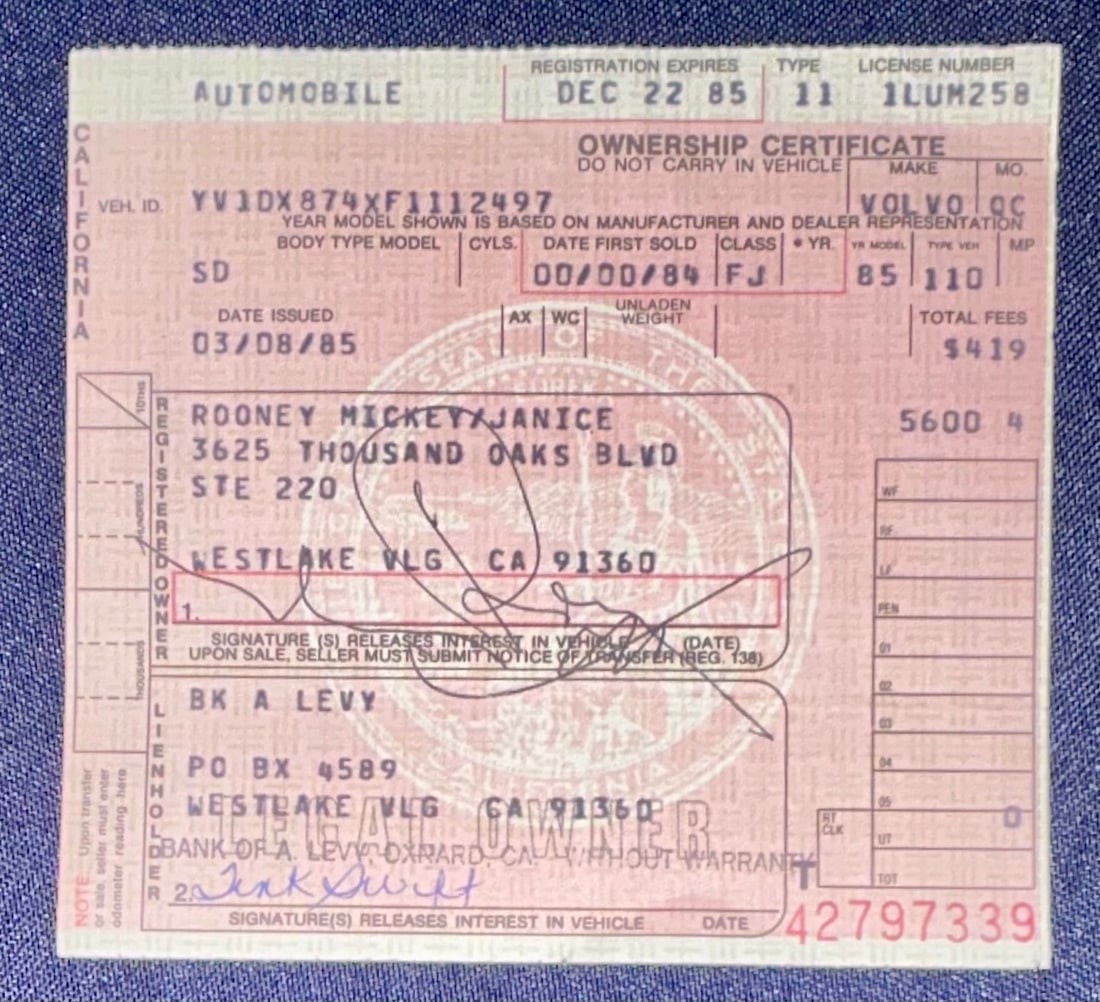 Mickey Rooney's Signed Pink Slip for 1985 Volvo (1 of 3)