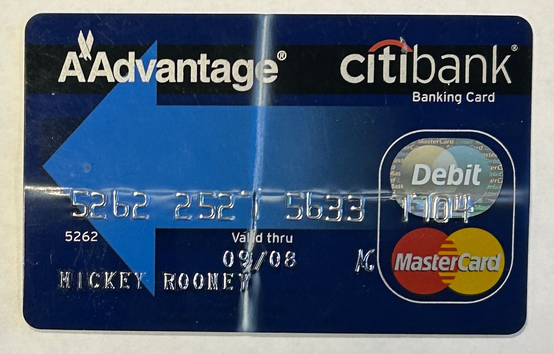 Mickey Rooney's Citibank Mastercard / Debit Card: Mickey Rooney's Citibank Mastercard / Debit Card. The card is not signed. Condition is bent and creased horizontally and vertically.