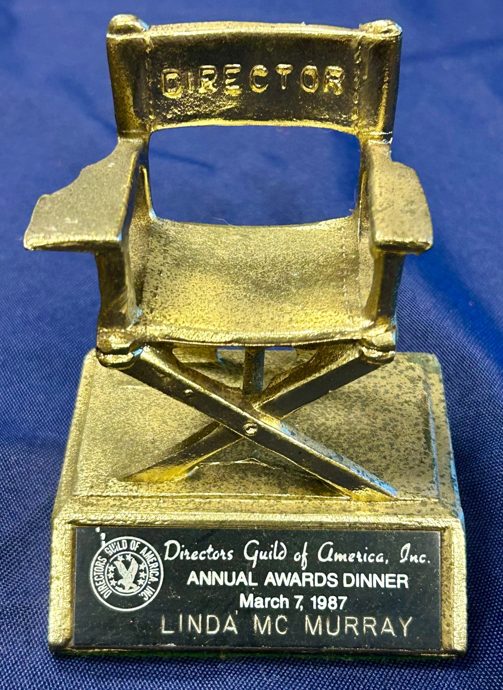 March 7, 1987 Directors Guild of America Annual Awards Dinner Miniature Director Chair: From the Estate of Mickey Rooney, a Directors Guild of America Annual Awards Dinner minitaure Director Chair with black face plate for Director of Cheers, Linda McMurray, the second woman admiited to 