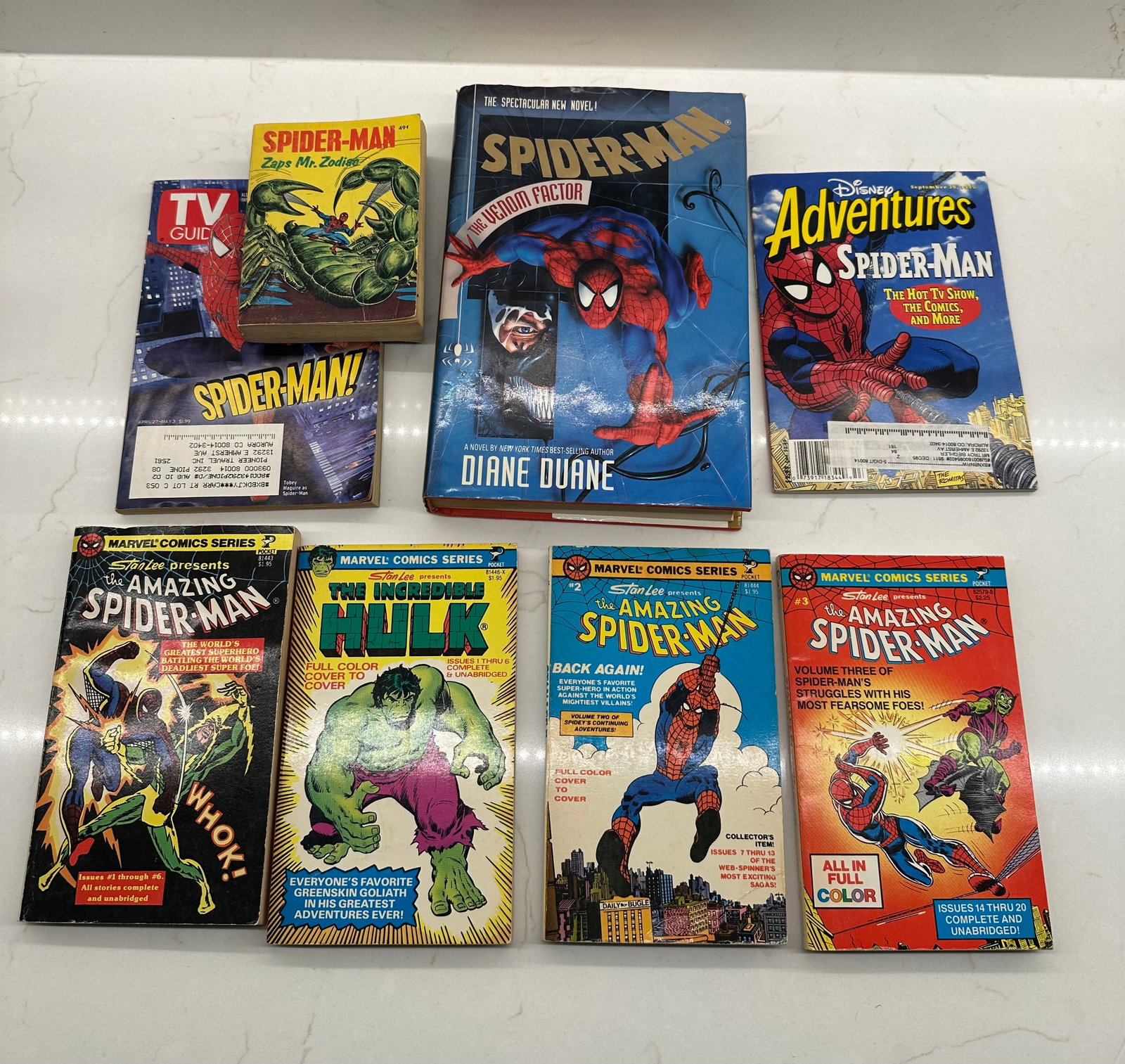 Spiderman books, Hulk,Zaps Zodiac, Stan Lee, Disney adventures, tv guide, The Venom Factor Hardcover: Spiderman books, Zaps Zodiac, Stan Lee, Disney adventures, tv guide, The Venom Factor Hardcover