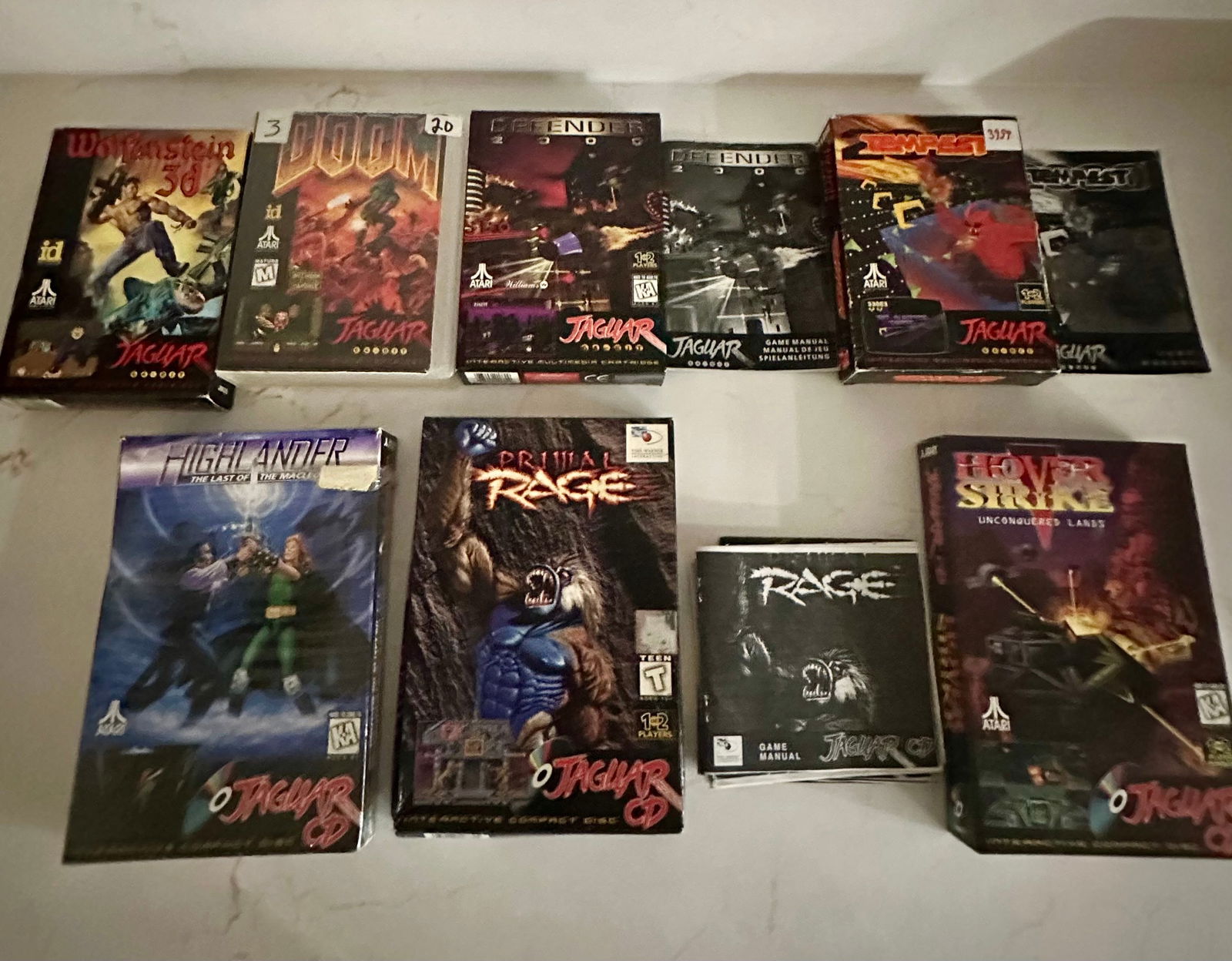 Atari Jaguar Boxes and Instruction manuals only no games included: Atari Jaguar Boxes and instruction manuals only no games included