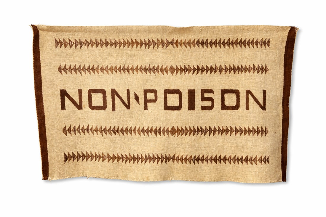 Southwestern-Style Handwoven “NON-POISON”;Textile, Possibly Native American,45”;x 27: Handwoven textile featuring bold “NON-POISON” lettering flanked by repeating geometric arrow motifs, rendered in dark brown on a natural ground with contrasting side borders. The design and we