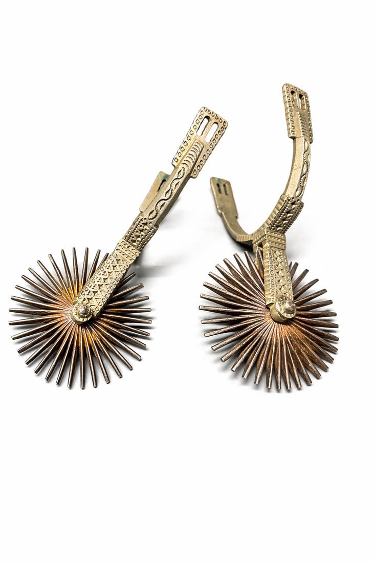 Pair of vintage DP-marked Western cowboy spurs with engraved steel arms and oversized star rowel (1 of 11)