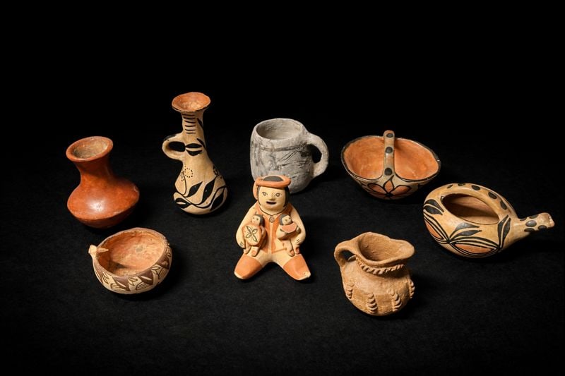 8-piece Native American miniature pottery assortment: 8-pc Native American miniature pottery lot, Santa Clara, Mancos B/W, Jemez storyteller, ladles & bowls, approx. 2–7 in., pueblo-style assortment.