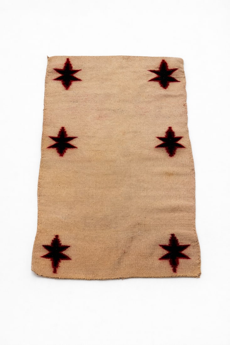 Handwoven Southwest / Navajo-Style Wool Rug or Blanket: featuring a warm tan field with six bold eight-point star medallions in deep red and black; traditional flat-weave construction; likely mid-20th century; wool fibers; rectangular format suitable as a