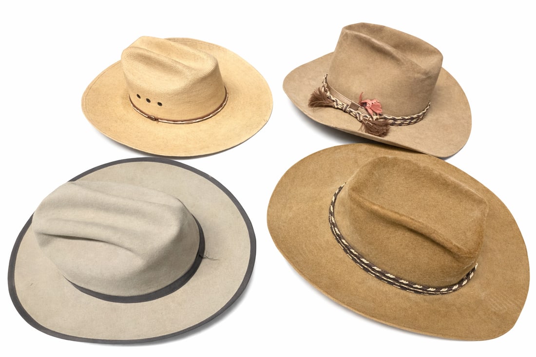 Four vintage Western felt cowboy hats incl. Resistol Self-Conforming & American Hat Co: Four vintage Western felt cowboy hats incl. Resistol Self-Conforming & American Hat Co., tan/gray/olive, approx. 3–3.5in brims, 4–4.75in crowns, sized 7 1/2 and 7 3/8 on two of the hats