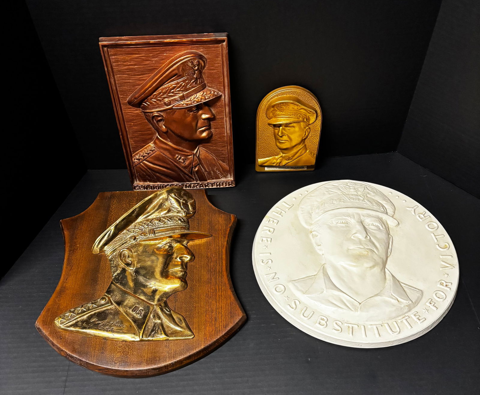 GROUP OF 4 GENERAL DOUGLAS MACARTHUR RELIEF PLAQUES (1 of 4)