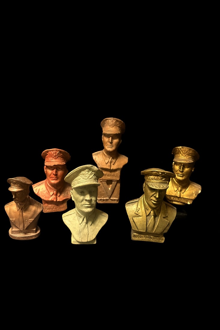 Collection of 7 General Douglas MacArthur Busts-Mixed Metal & Ceramic: A diverse collection of 7 vintage busts. 5 metal and 2 ceramic. Largest Bust is 7in H X 4inW The rest are approx 5in H X 3.5 in W