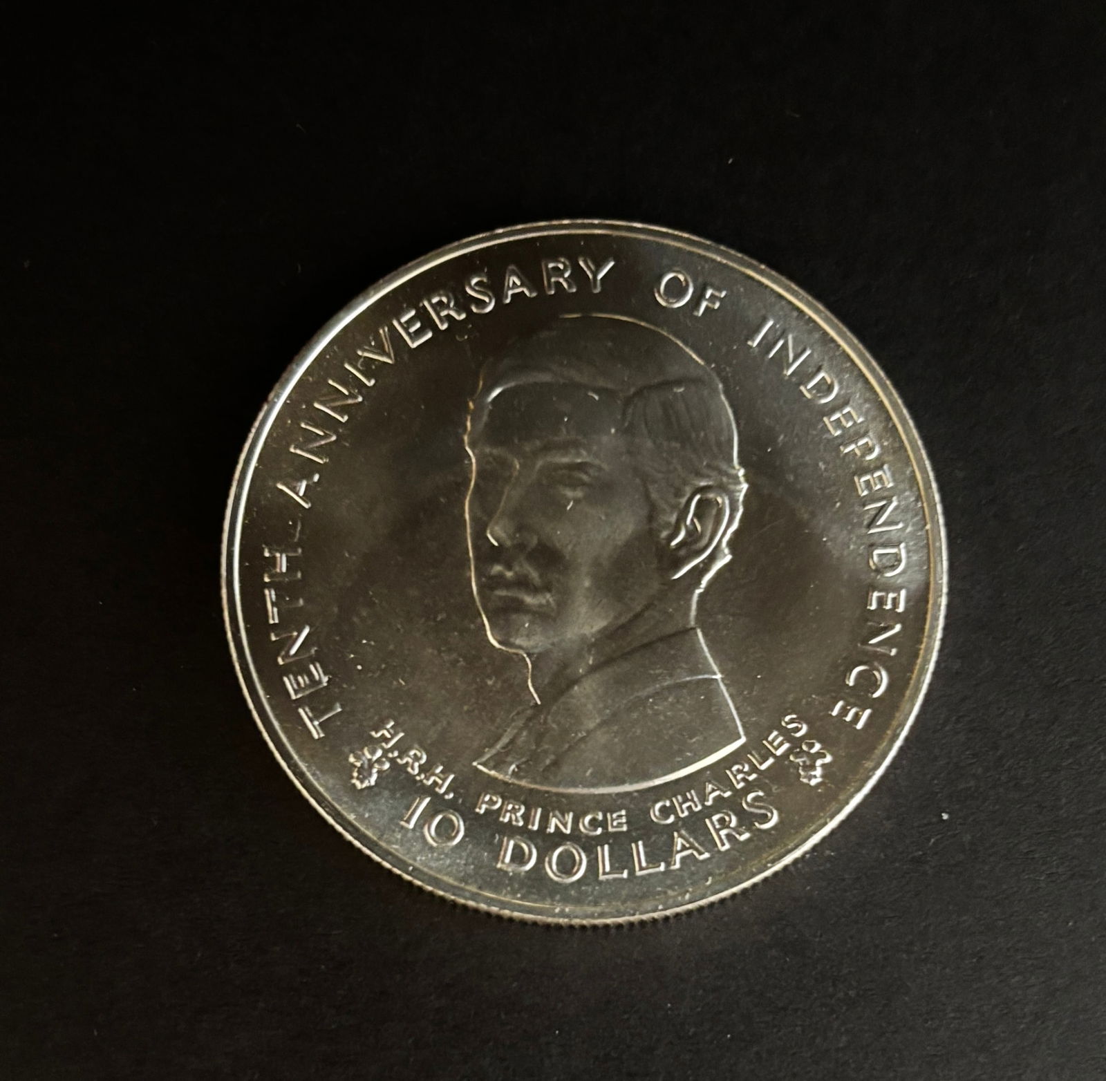 1980 Fiji $10 Silver Independence Proof: 1980 Fiji Ten Dollar Silver Proof commemorating the 10th Anniversary of Independence (10 Oct 1980). Features H.R.H. Prince Charles obverse and Fiji coat of arms reverse. Original blue presentation