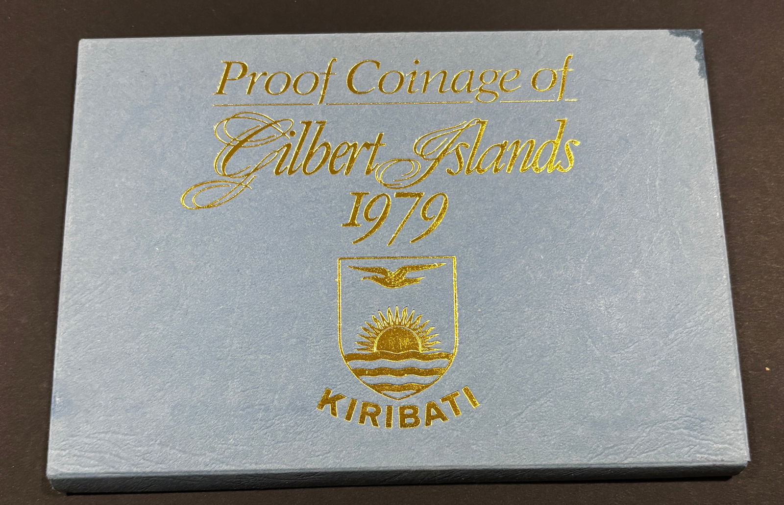 1979 Kiribati Proof Coin Set Gilbert Islands First Year Issue w/ Case & Papers: 1979 Kiribati (formerly Gilbert Islands) official proof coinage set issued for the nation’s first year of independence. Royal Mint struck proof coins with mirrored fields and frosted designs