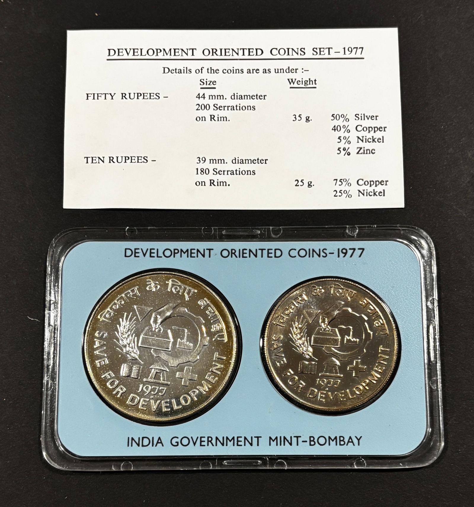 1977 India Development Oriented Coins Proof Set Bombay Mint Save For Development: 1977 India “Development Oriented Coins” Proof Set issued by the India Government Mint, Bombay, comprising 50 Rupees and 10 Rupees commemorative coins featuring the Ashoka Lion Capital obverse