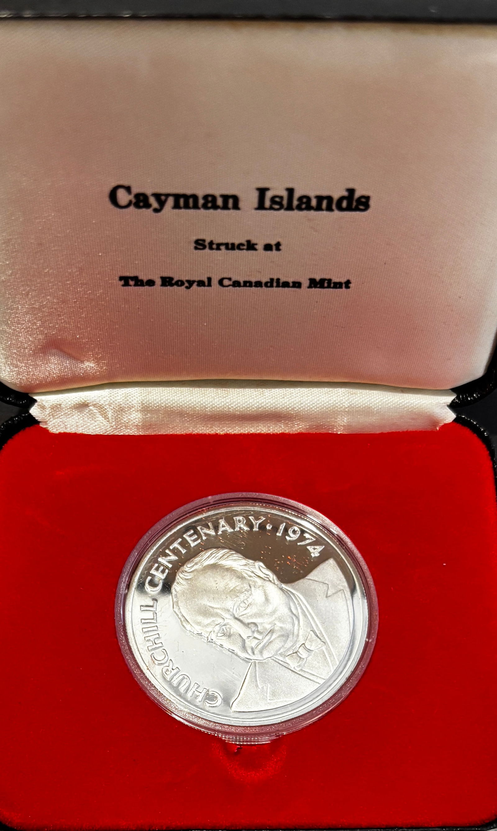 1974 Cayman Islands Churchill Centennial Proof $20 Silver Coin With Box & COA: 1974 Cayman Islands Winston Churchill Centennial commemorative proof $20 silver coin struck by the Royal Canadian Mint, issued to mark the 100th anniversary of Churchill’s birth (1874–1974).