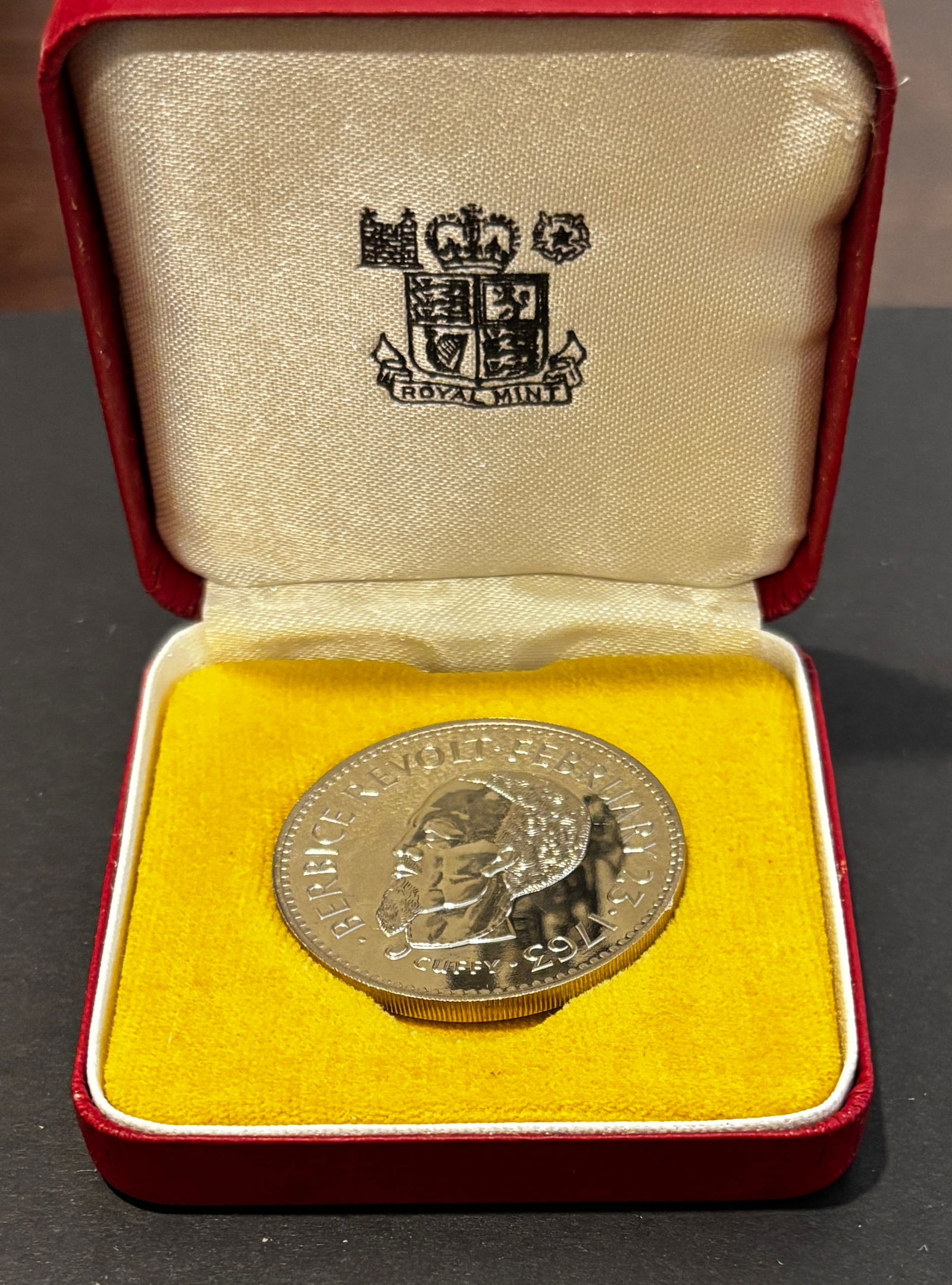 1963 Haiti 25 Gourdes Silver Proof Coin In Royal Mint Case: 1963 Republic of Haiti 25 Gourdes silver proof coin featuring the left-facing portrait of François “Papa Doc” Duvalier with legend “République d’Haïti 25 Gourdes 1963,” struck in