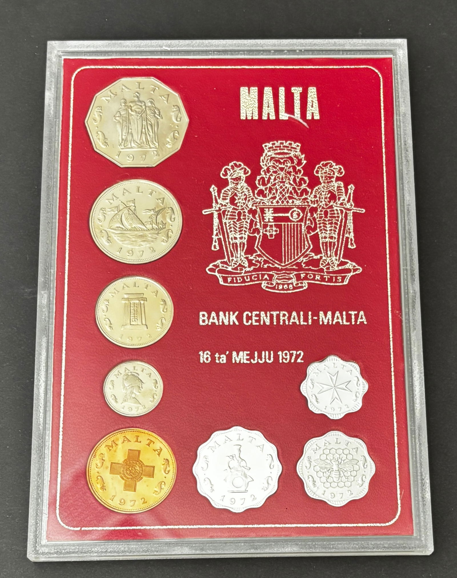 1972 Malta Bank Centrali-Malta Proof Coin Set In Original Holder: Original 1972 Republic of Malta proof coin set issued by the Bank Centrali-Malta and housed in the original presentation holder dated 16 ta’ Mejju 1972. The set includes the complete denomination se